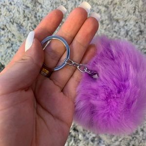 purple puff ball keychain